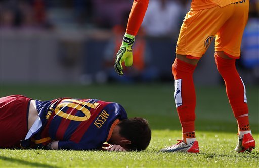 ap-barcelonas-messi-tears-knee-ligament-out-7-8-weeks